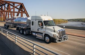 Liquid Trucking Hikes Driver Pay 1 Liquid Trucking Truck going over bridge, Liquid Trucking Hikes Driver Pay
