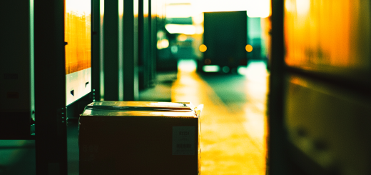 Package in warehouse with truck in distance