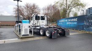 EV Hazmat Transport Risks: 7 Key Questions in PHMSA’s Federal Review 3 Freightliner eCascadia electric Class 8 truck charging at a station