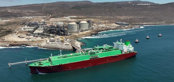 LNG carrier and tugboats offshore from Energía Costa Azul LNG during the terminal’s first commissioning cargo.