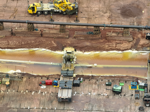 Aerial view of a flatbed truck in the excavated Enbridge Line 5 valve site in Iron County, Wisconsin, on Aug. 29, 2026.