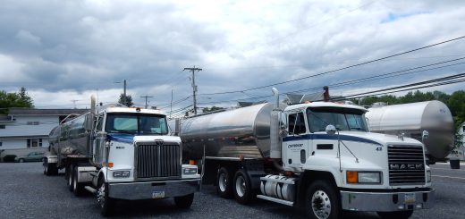 Milk-hauling trucks parked at the Centerport Milk Hauling Cooperative in Pennsylvania.