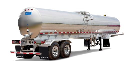 Rear three-quarter view of a polished Wabash Acutherm sanitary tank trailer with tandem axles and a side access ladder.